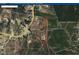 GIS view of the property showcasing lot lines, surrounding roads, and the location of the home at 7936 Nc 42, Holly Springs, NC 27540