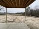 Covered back porch featuring bare ground at 880 Olive Branch Dr, Smithfield, NC 27577