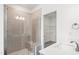 Bathroom with glass shower, a vanity, and tiled floors at 9173 Dupree Meadow Ct # 25, Angier, NC 27501