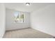 Bright bedroom with neutral carpet, two windows, and white walls for a light, airy feel at 9173 Dupree Meadow Ct # 25, Angier, NC 27501