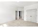Bedroom featuring neutral carpeting, white walls, and double closets at 9173 Dupree Meadow Ct # 25, Angier, NC 27501