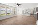 Open-concept floor plan with an island kitchen and stainless steel appliances at 9173 Dupree Meadow Ct # 25, Angier, NC 27501