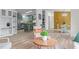 Spacious living area featuring a glimpse of the kitchen, modern furnishings, and a bright atmosphere at 92 Papoose Trl, Lillington, NC 27546