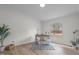 Cozy office with wood-look flooring, neutral color palette, a window, and natural light at 92 Papoose Trl, Lillington, NC 27546