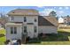 Backyard with a play area, a patio, and a green manicured lawn at 101 Cambridge Way, Oxford, NC 27565