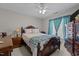Comfortable bedroom featuring a cozy bed, natural light, and classic furniture for a relaxing ambiance at 101 Cambridge Way, Oxford, NC 27565