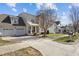Well-maintained two-story home featuring a large driveway and a two-car garage at 101 Cambridge Way, Oxford, NC 27565