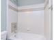 Bathroom with tiled shower and chrome shower head at 101 Hedwig Ct, Cary, NC 27518