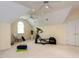 Bright bedroom with ample space for exercise equipment, a comfortable chair, and natural light at 101 Hedwig Ct, Cary, NC 27518