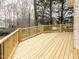 New wooden deck overlooking a beautifully landscaped backyard perfect for entertaining and relaxation at 101 Hedwig Ct, Cary, NC 27518