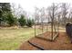 Backyard with lawn, garden and trees at 103 Westview Dr # D, Carrboro, NC 27510
