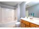 Bright bathroom featuring a shower-tub combination and a single sink vanity at 103 Westview Dr # D, Carrboro, NC 27510