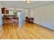 Open living area with wood floors and eat-in kitchen at 103 Westview Dr # D, Carrboro, NC 27510