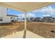 Large backyard with a covered patio, providing an ideal space for outdoor activities and relaxation at 105 Hanover Ct, Clayton, NC 27527