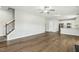 Open concept living room featuring hardwood floors and stairs leading to the second floor at 105 Hanover Ct, Clayton, NC 27527