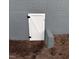 Exterior basement access door to a secure basement, providing convenient and easy access for maintenance at 1128 Horseshoe Rd, Durham, NC 27703