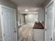 Modern kitchen with light gray walls and white cabinets at 1128 Horseshoe Rd, Durham, NC 27703