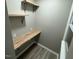 Well-organized pantry with floating shelves and ample storage space, perfect for keeping your kitchen clutter-free at 1128 Horseshoe Rd, Durham, NC 27703