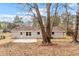Exterior shot from the back of the house showing patio and well maintained exterior at 1206 Dubose St, Garner, NC 27529