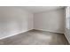 This bedroom offers neutral paint, bright natural light, and wood-look flooring at 1206 Dubose St, Garner, NC 27529