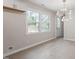 Dining area with a hanging light fixture and views of the backyard at 1206 Dubose St, Garner, NC 27529