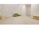 A bonus room with a modular sofa and hardwood accents at 121 Sacred Fire Rd, Louisburg, NC 27549