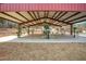 Outdoor fitness area featuring a variety of exercise machines under a covered pavilion for residents to enjoy at 121 Sacred Fire Rd, Louisburg, NC 27549
