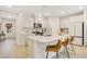 Bright kitchen with an island, stainless steel appliances, and sleek countertops for modern appeal at 121 Sacred Fire Rd, Louisburg, NC 27549
