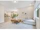 Bright living space with an open floor plan, stylish decor, and seamless flow to the kitchen and dining at 121 Sacred Fire Rd, Louisburg, NC 27549