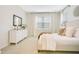 Spacious main bedroom featuring soft carpet, a dresser with mirror, and ambient lighting creating a cozy retreat at 121 Sacred Fire Rd, Louisburg, NC 27549