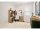 Home office featuring a built-in desk, chair, and natural light from a window at 121 Sacred Fire Rd, Louisburg, NC 27549