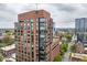 Exterior shot of the Quorum Center offering distinctive architecture and urban convenience at 122 N Harrington St # 1105, Raleigh, NC 27603
