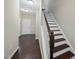 Inviting foyer with hardwood floors and a staircase leading to the upper level at 1319 Rodessa Run, Raleigh, NC 27607