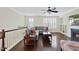 Cozy living room with hardwood floors, fireplace, and comfortable seating at 1319 Rodessa Run, Raleigh, NC 27607