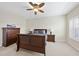 Bright main bedroom with ceiling fan and carpet flooring at 1319 Rodessa Run, Raleigh, NC 27607