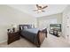 Spacious main bedroom with ceiling fan, and ensuite bathroom at 1319 Rodessa Run, Raleigh, NC 27607