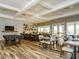 Spacious clubhouse with communal areas, a large island, and seating, creating a welcoming atmosphere at 177 Magenta Rose Dr, Raleigh, NC 27610