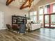 Elegant clubhouse interior with high ceilings, wood beams, and stylish furniture, ideal for relaxation at 177 Magenta Rose Dr, Raleigh, NC 27610