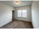 Clean, empty bedroom with carpet and natural light at 208 Acorn Crossing Rd, Holly Springs, NC 27540