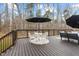 Spacious back deck offers an outdoor dining area with comfortable seating at 2418 Crossroads Ave, Hillsborough, NC 27278
