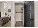 Walk-in closet with hanging racks and modern flooring at 2418 Crossroads Ave, Hillsborough, NC 27278