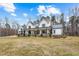 Attractive two-story house with a wide front yard and a covered porch at 2418 Crossroads Ave, Hillsborough, NC 27278
