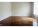 Spacious bedroom featuring gleaming hardwood floors at 250 S Estes S Dr # Apt 113, Chapel Hill, NC 27514