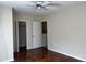 Bedroom featuring gleaming hardwood floors and closet at 250 S Estes S Dr # Apt 113, Chapel Hill, NC 27514