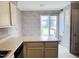 Kitchen nook area with natural light from a large window overlooking the outdoors at 250 S Estes S Dr # Apt 113, Chapel Hill, NC 27514