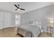 Bedroom with wood-look flooring and doorway to a bathroom at 2520 Friedland Pl # 102, Raleigh, NC 27617