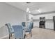 Cozy dining area with a glass table, stylish chairs, and modern lighting at 2520 Friedland Pl # 102, Raleigh, NC 27617