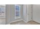 Bright entryway featuring a window, neutral walls, and tile flooring at 2520 Friedland Pl # 102, Raleigh, NC 27617