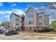 Well-kept apartment complex with reserved parking, set against a beautiful sky, offering comfortable and accessible living at 2520 Friedland Pl # 102, Raleigh, NC 27617