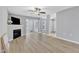 Expansive living room with hardwood floors, leading to multiple rooms with lots of natural light at 2520 Friedland Pl # 102, Raleigh, NC 27617